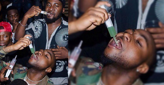 Davido Pictured Drinking With A Syringe