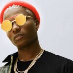 Wizkid Caught Kissing Mysterious Lady in a Club