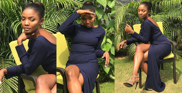 Simi Flashes Hot Legs In Navy Blue Dress