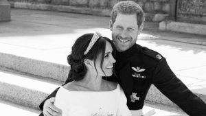 Harry and Meghan return to Kensington Palace wearing sunglasses as they begin married life