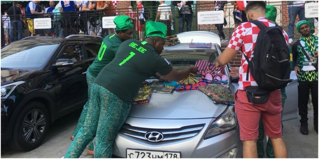 Nigerians sell Ankara fabric at the World Cup