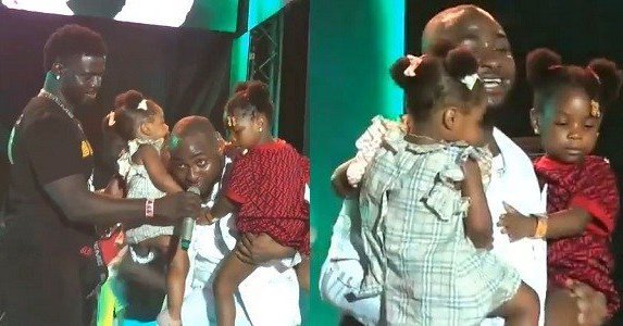 Davido brings up his two daughters on stage at his concert (video)
