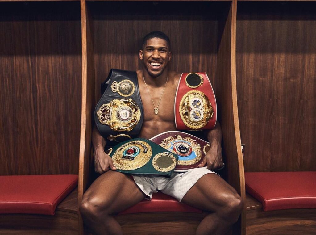 Anthony Joshua Shows Off Title Belts - PHOTOS