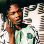 Lady Gets Naira Marley's Name Tattooed On Her Body