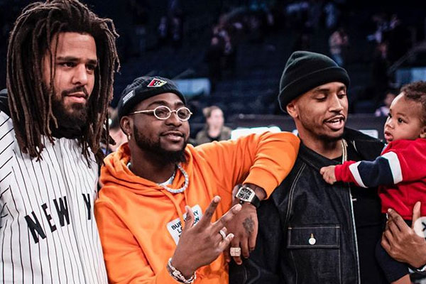 Davido pictured with US music artists, Trey Songs and J-Cole