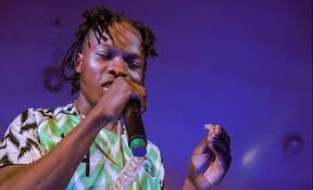Naira Marley reacts as court orders arrest over car theft