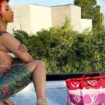 Pantless Cardi B shows off her gorgeous tattoo