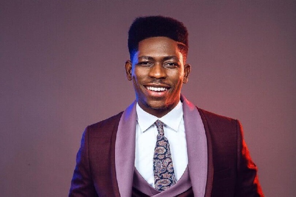 Gospel-singer-Moses-Bliss-gifts-three3-cars-to-his-new.png