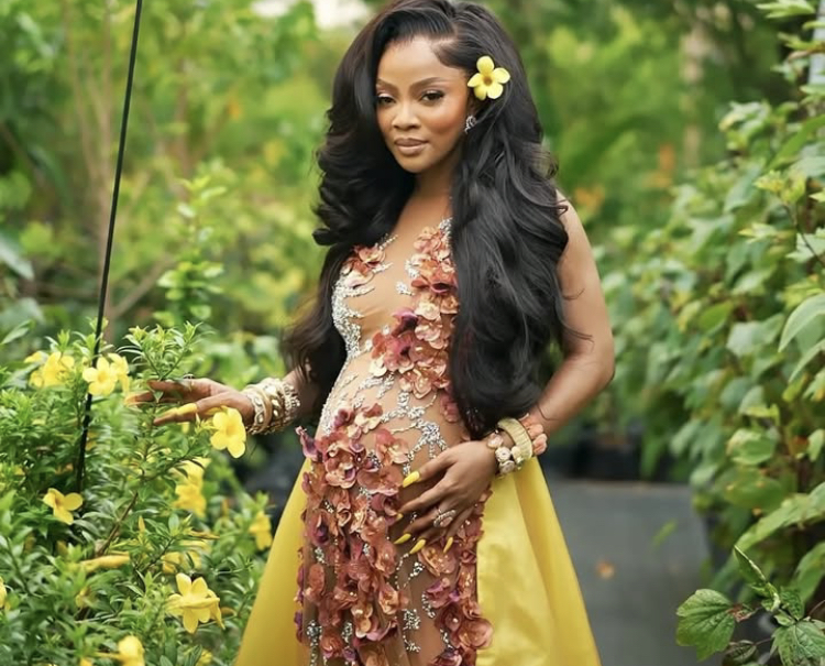 “Toke Makinwa announces she is pregnant, calling it the biggest project of her life.”