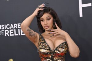Cardi B tour 2025 stage performance with fans cheering
