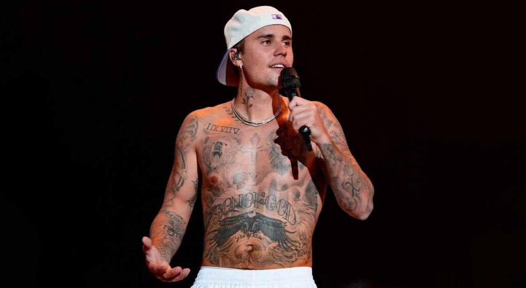 Justin Bieber with Tems, Bakar, and Hurricane Chris promoting Swag II 2025