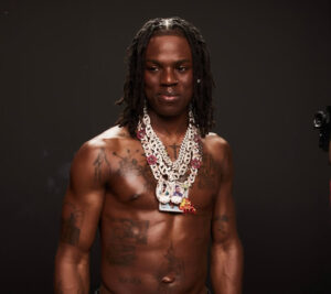 Rema seen in Accra, Ghana, filming the music video for his upcoming single “Fun” with local dancers and vibrant visuals.