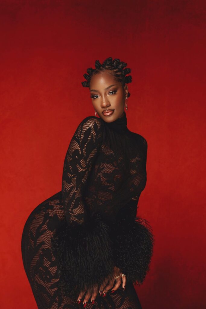 Tems performing live at Blankets and Wine Festival Kenya 2025 on stage