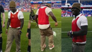 Afrobeats artist Asake at MLS soccer game coin toss