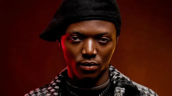 Chella performing live or posing for promo shots after releasing his new single “Chella Chant,” which has already received approval from Wizkid, sparking buzz among Afrobeats fans.