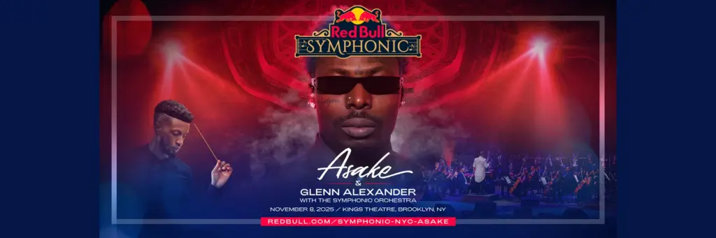 Asake performing an unreleased song with K-pop artists on stage at Red Bull Symphonic