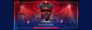 Asake performing an unreleased song with K-pop artists on stage at Red Bull Symphonic