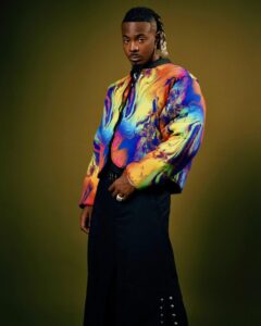 Youngjonn performing live with disco-inspired Afrobeat energy for Blue Disco”