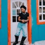 Shoday performing live on stage during The Shoday Experience with a star-studded audience.