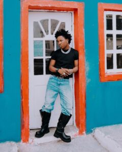 Shoday performing live on stage during The Shoday Experience with a star-studded audience.