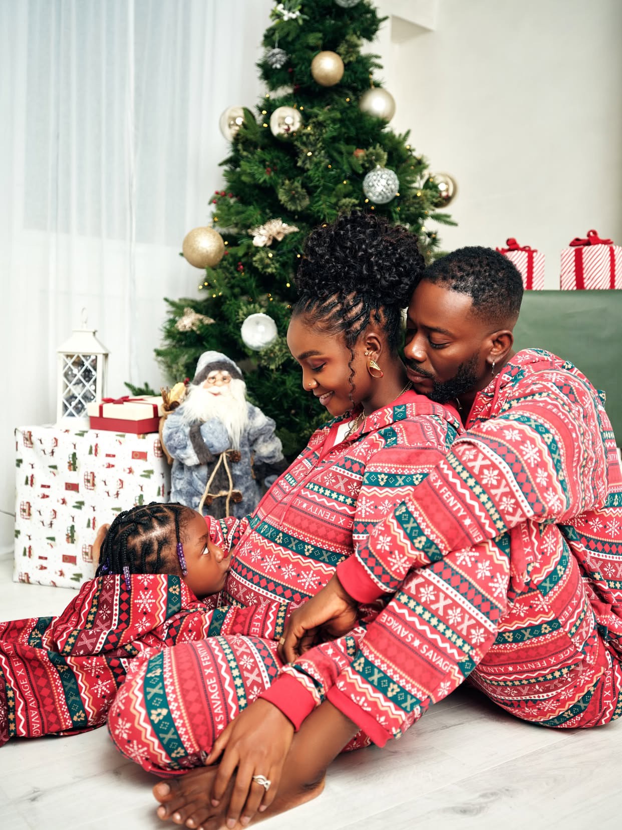 Adekunle Gold and Simi celebrating as they welcome twins