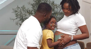 Adekunle Gold and Simi celebrating as they welcome twins