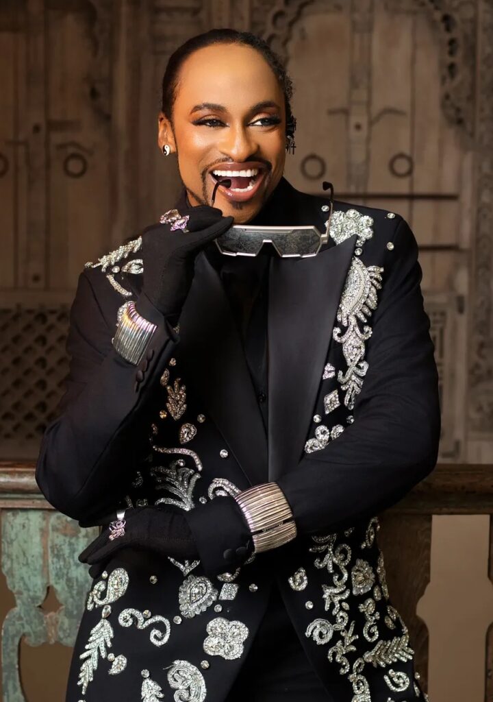 Denrele Edun discussing the Denrele Edun ageless skin glow during a radio interview on Max FM.