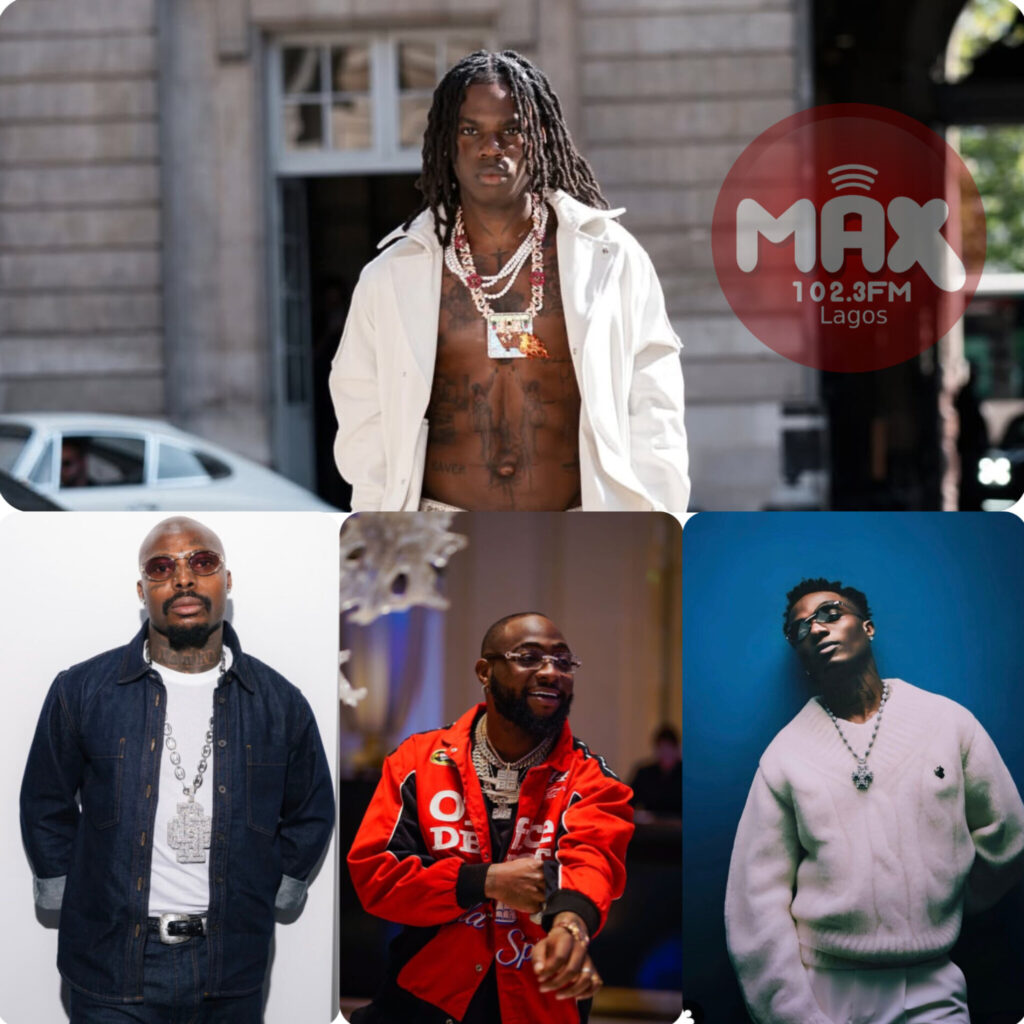 Rema celebrates his triple win at the 9th AFRIMA Awards in Lagos, Nigeria.