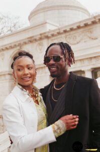 Mr Eazi and Temi Otedola smiling together, showcasing their stylish and playful celebrity marriage