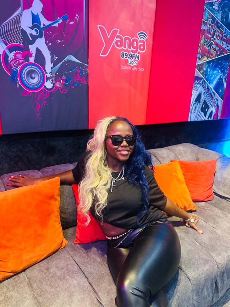 Sweet Yet Nuclear performing or speaking about the inspiration behind All In Order and her cultural musical influences.