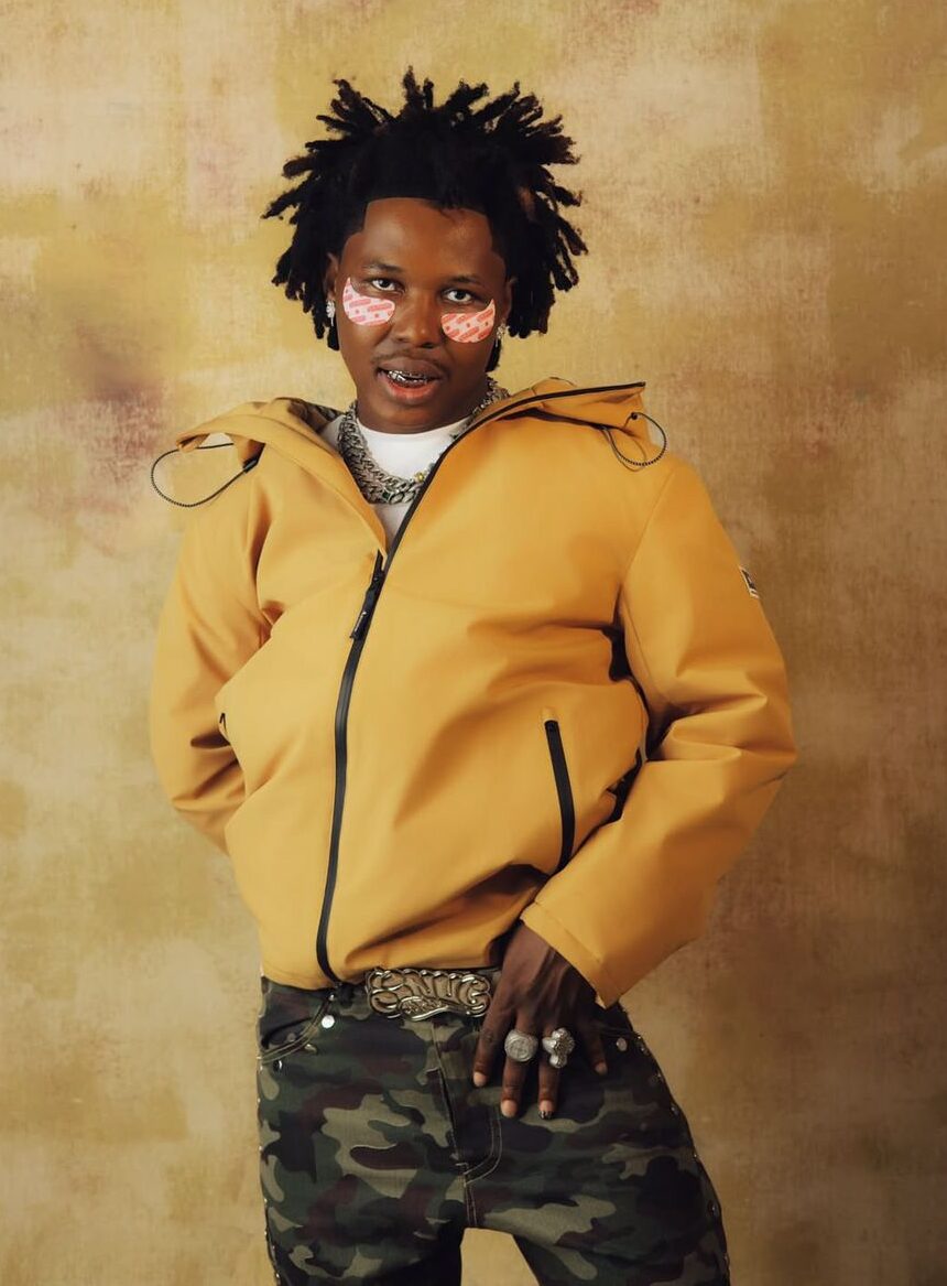 Shoday discussing repeating clothes and societal pressure in a music interview.