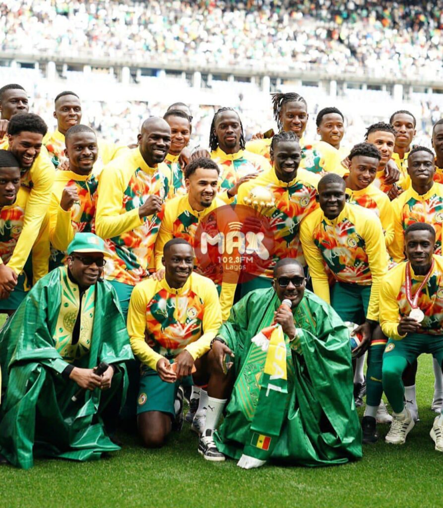 Senegal team parades AFCON trophy in France during Senegal AFCON trophy controversy after beating Peru 2-0.