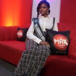 Faith Ogbah speaking confidently after overcoming her past and embracing her voice.