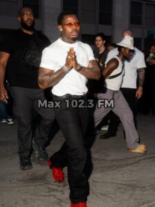 Asake performs songs from his album M$NEY during Christian Louboutin's Paris Fashion Show in 2026.