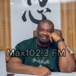 Don Jazzy in a recording studio producing Afrobeats hits for Mavin Records artists.