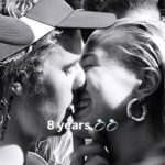 Hailey Bieber and Justin Bieber share a kiss in a black-and-white selfie posted to celebrate eight years since their engagement.