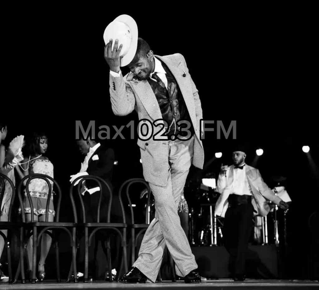 USHER and Chris Brown performing together during the opening night of the USHER and Chris Brown R&B Tour in Denver.
