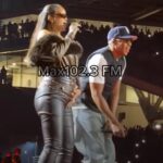 Rihanna performs with Jay-Z during the final Yankee Stadium concert, performing "Run This Town" before a cheering crowd.