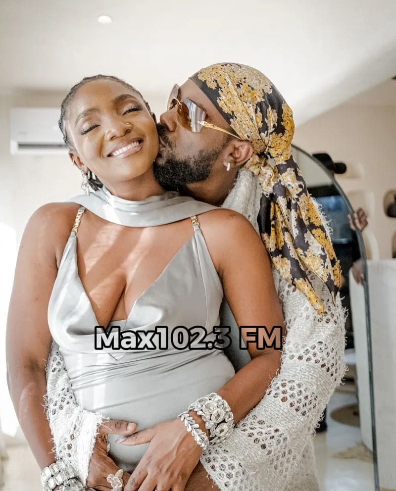 Adekunle Gold and Simi share a romantic moment in the Blue Fire music video.