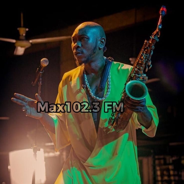 Seun Kuti reacts after an MC compares Wizkid to Fela during Peller and Jarvis' wedding celebration.
