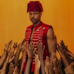 LADIPOE posing during the REVIVAL album era